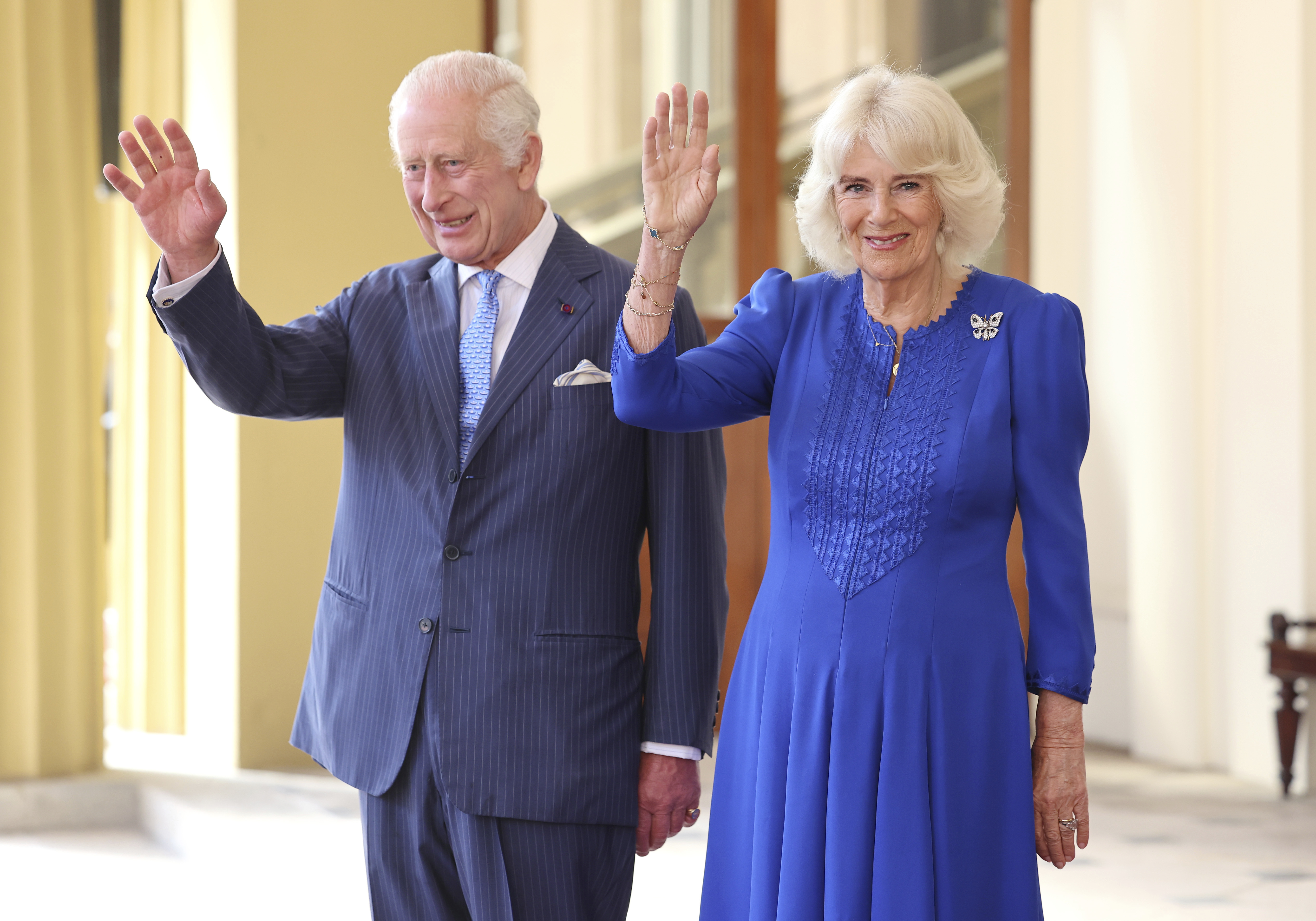 FILE - Britain's King Charles III and Queen Camilla, wave as they formally bid farewell to Japan's Emperor Naruhito and Empress Masako on the final day of their state visit to Britain at Buckingham Palace, London, Thursday, June 27, 2024. King Charles III is preparing to visit Australia and Samoa in October 2024, an itinerary that will span 12 time zones and test the monarch’s stamina as he recovers from cancer treatment. The trip was announced on Sunday, July 14, 2024, by Buckingham Palace. (Chris Jackson/Pool Photo via AP, File)