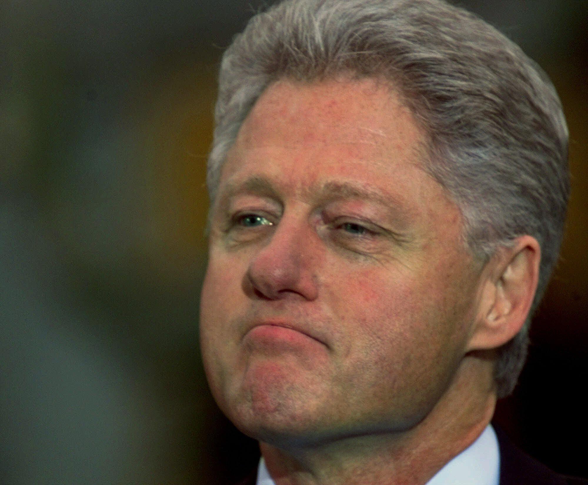 FILE - President Bill Clinton looks on as Vice President Gore addresses members of congress outside the Oval Office after the House of Representatives voted to impeach the president, Dec. 19, 1998, in Washington. Independent Counsel Kenneth Starr concluded that Clinton had lied under oath and obstructed justice. That led to the House voting to impeach Clinton on Dec. 19, 1998. He was acquitted by the Senate, allowing Clinton to remain in office until his term ended in January 2001. (AP Photo/Doug Mills, File)