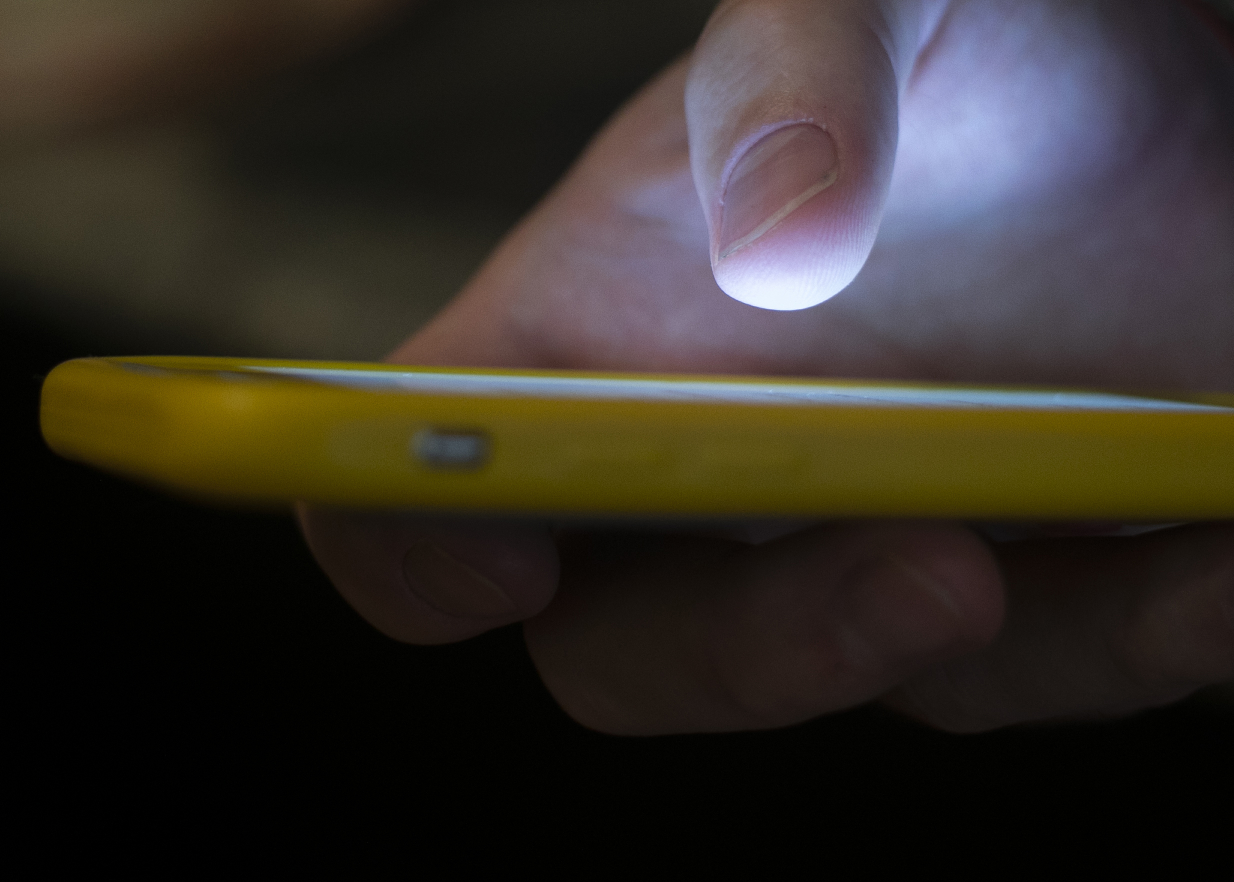 FILE - A man uses a cell phone in New Orleans on Aug. 11, 2019. Some social media users are calling out celebrities for what they say is inaction in the face of a humanitarian crisis in Gaza — and they've taken to a "blockout" to pressure the stars to take a stand. For the blockout, users put a block on seeing any and all content from the accounts of certain celebrities on social media platforms including X, TikTok and Instagram. (AP Photo/Jenny Kane, File)