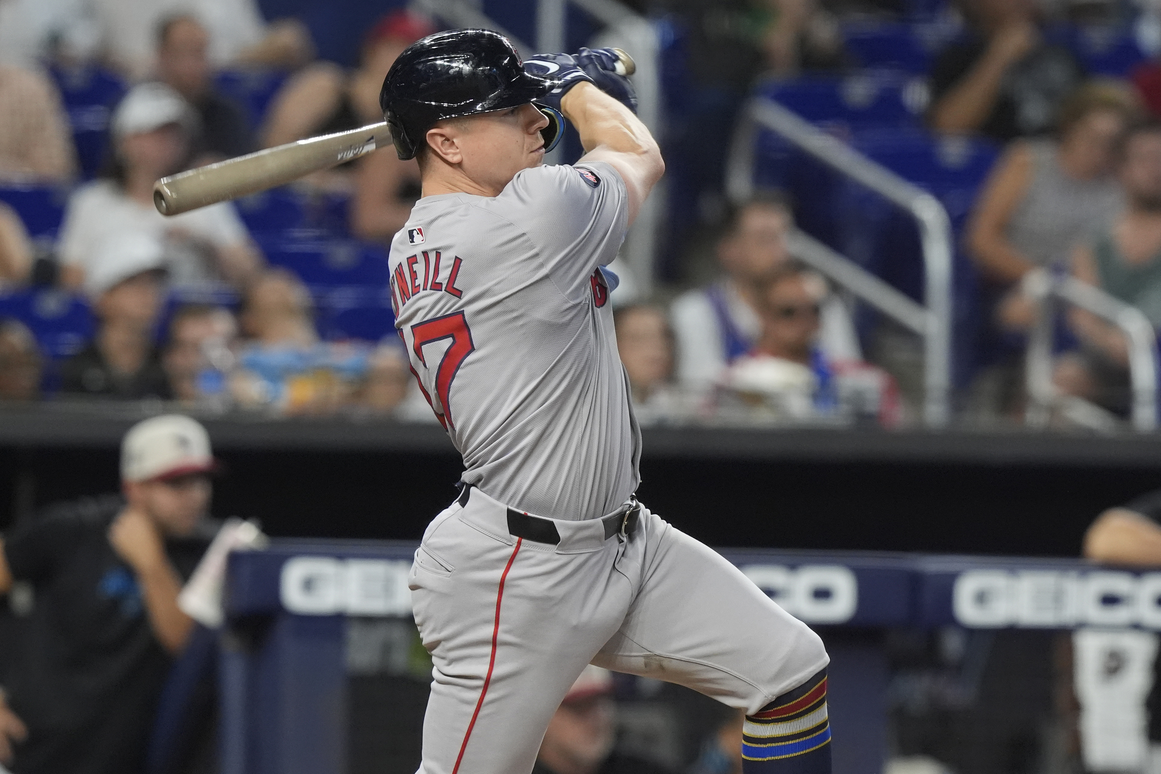 Boston Red Sox's Tyler O'Neill hits a double to center field during the 12th inning of a baseball game against the Miami Marlins, Thursday, July 4, 2024, in Miami. (AP Photo/Marta Lavandier)