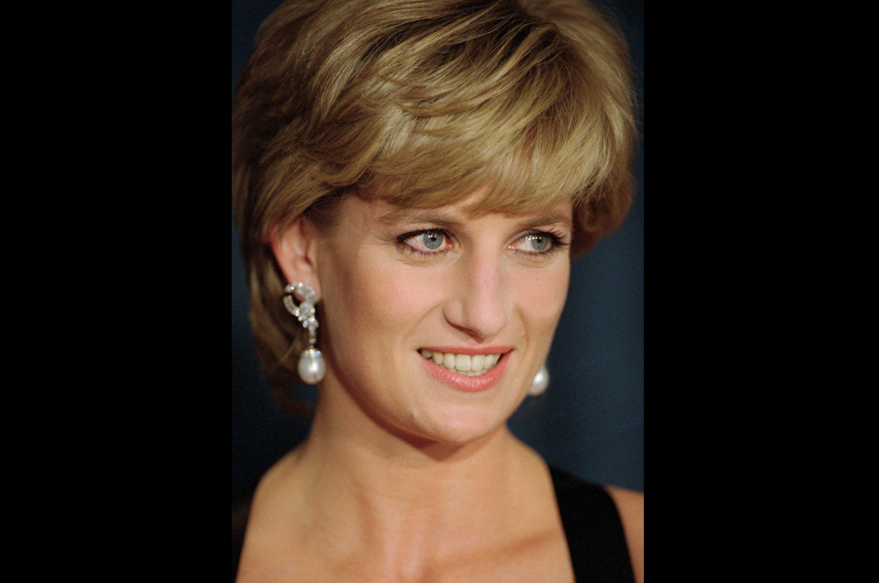 FILE - In this Dec. 11, 1995 file photo, Diana, Princess of Wales, smiles at the United Cerebral Palsy's annual dinner at the New York Hilton. An investigation has found that a BBC journalist used “deceitful behavior” to secure an explosive interview with Princess Diana in 1995, in a “serious breach” of the broadcaster’s guidelines. The probe came after Diana’s brother, Charles Spencer, made renewed complaints that journalist Martin Bashir used false documents and other dishonest tactics to persuade Diana to agree to the interview. (AP Photo/ Mark Lennihan, file)