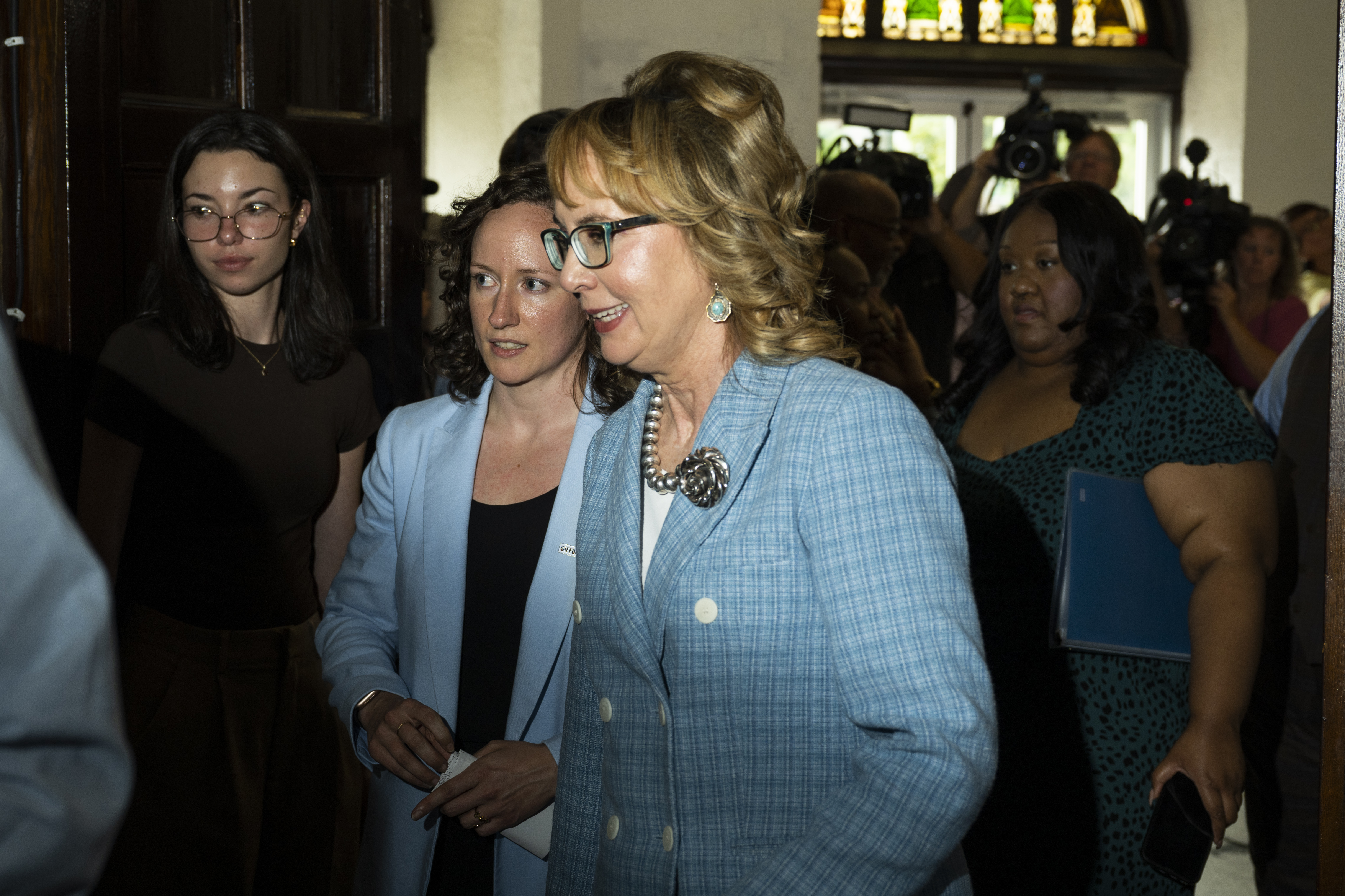 Former U.S. Rep. Gabby Giffords exits following a campaign event for Vice President Kamala Harris, Thursday, July 25, 2024 in Philadelphia. (AP Photo/Joe Lamberti)