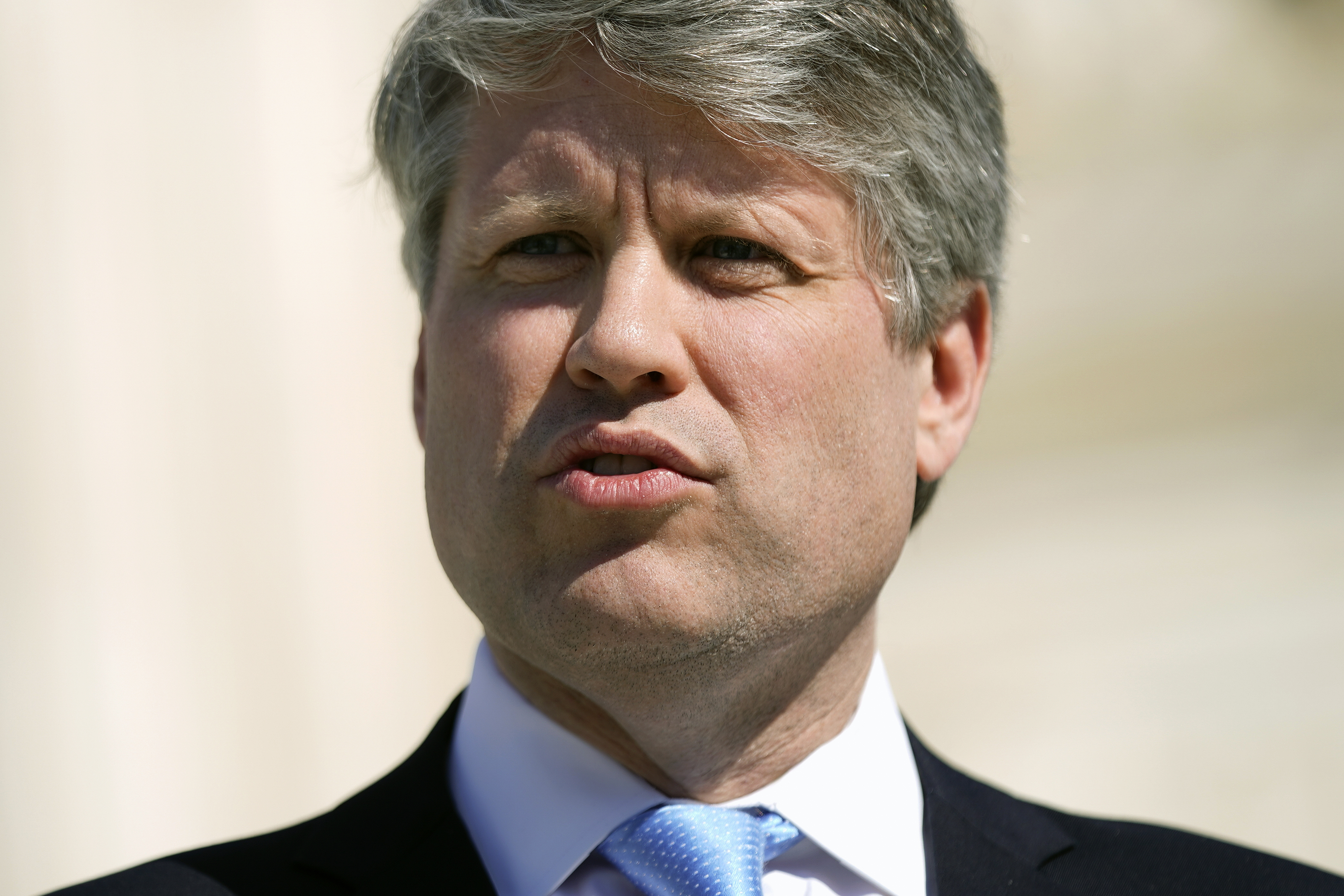 FILE - Nebraska Attorney General Mike Hilgers speaks with members of the media outside the Supreme Court on Capitol Hill, Feb. 28, 2023, in Washington. (AP Photo/Patrick Semansky, File)