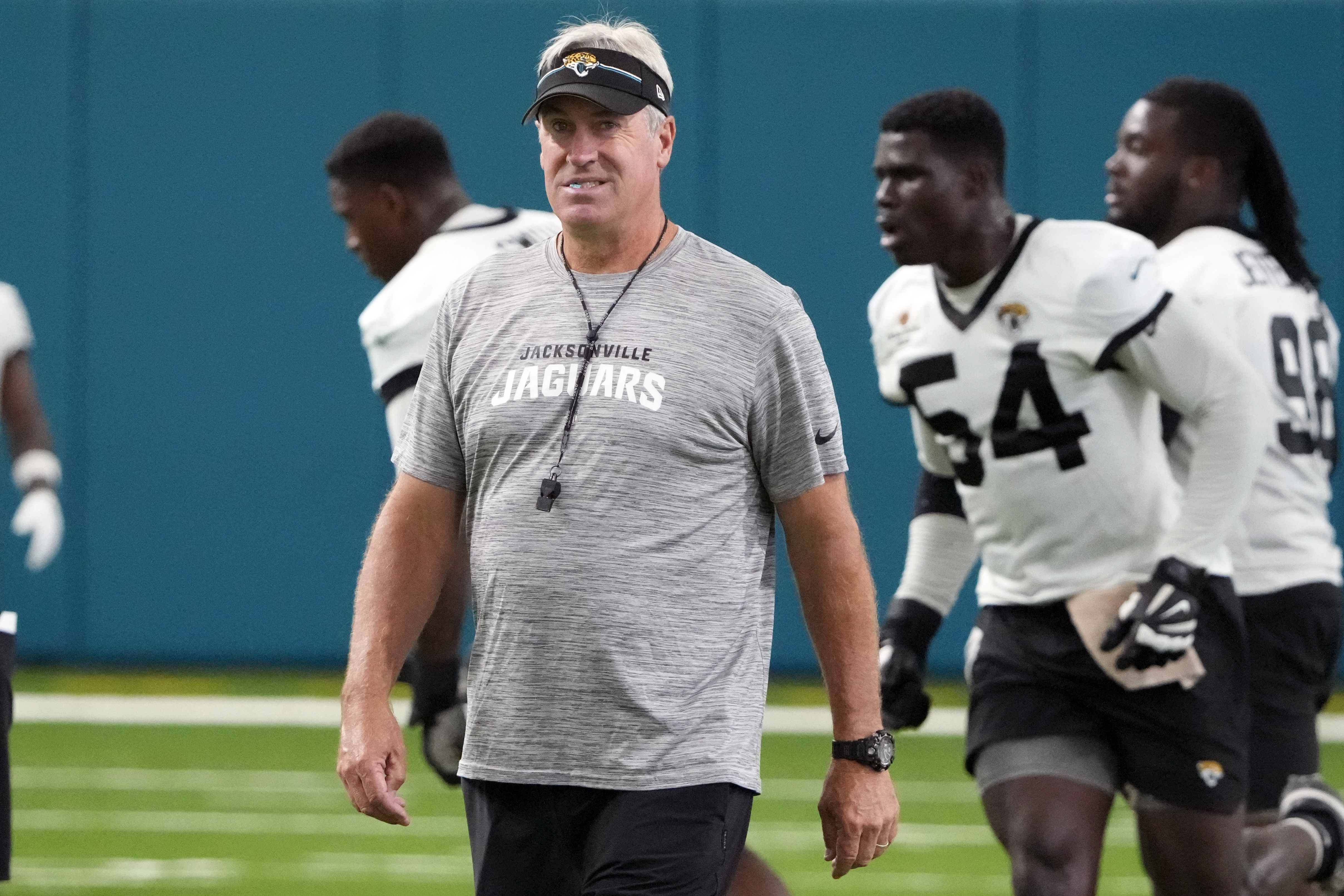 Jacksonville Jaguars head coach Doug Pederson watches players perform during the team's NFL football practice, Monday, June 10, 2024, in Jacksonville, Fla. (AP Photo/John Raoux)