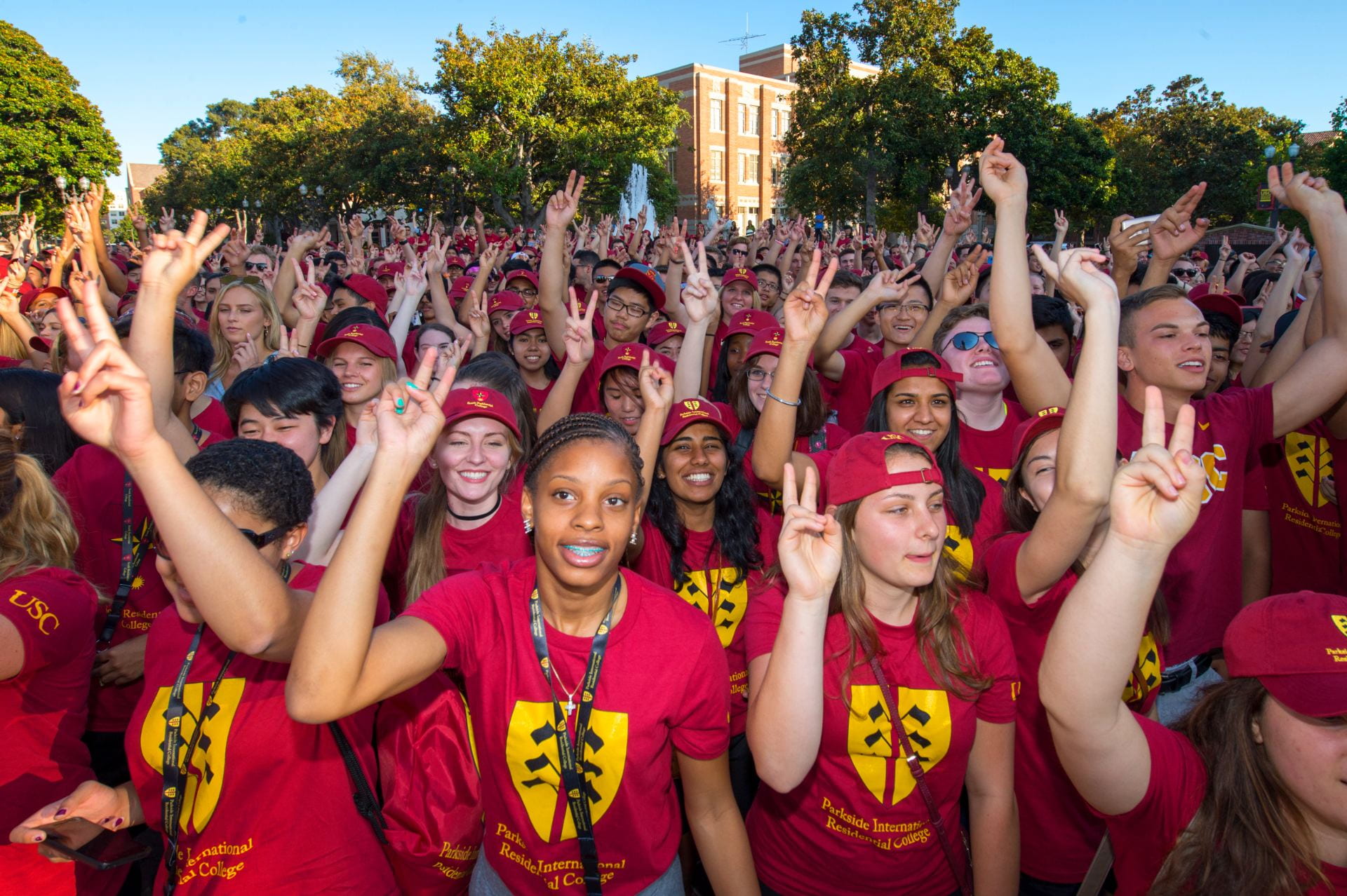 New USC students take part in a Spirt Rally featuring the Trojan Marching band.