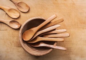 An image of a crafted wooden spoon for an article about "how to make a wooden spoon."