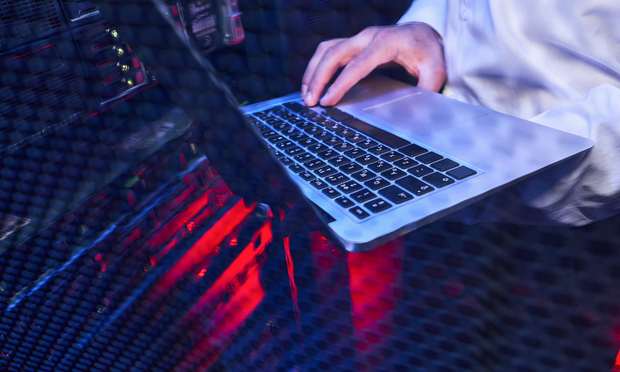 Zoomed in shot of hand on a keyboard in abstract setting