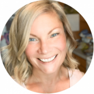 Headshot of Katie Tiss, wearing a light pink shirt, with short blonde hair