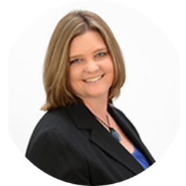 Headshot of Stephanie Orr, with short brown hair, wearing a black blazer with a white background