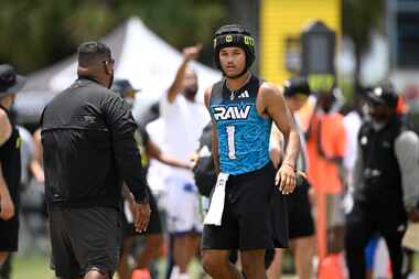 Raw quarterback Ty Hawkins (1) against Coastline Stars during the OT7 Championships football...