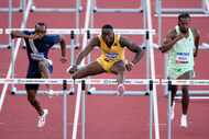 Grant Holloway wins the men's 110-meter hurdles final during the U.S. Track and Field...