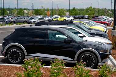 Unsold 2024 Ioniq 5 electric vehicles sit on display at a Hyundai dealership Sunday, June...