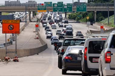 Traffic backs up along Interstate 30, Tuesday, June 18, 2024, in Grand Prairie, Texas.