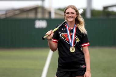 Melissa junior shortstop Caigan Crabtree poses on the softball field at Melissa High School...