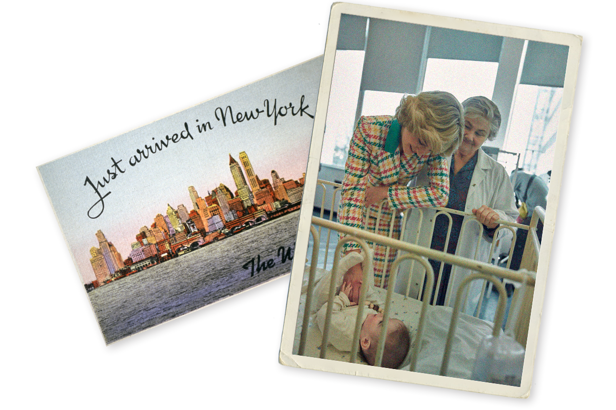 A post card that says ‘Just arrived in New York’ and a shot of Princess Diana leaning over a crib looking at a baby. 