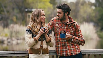 Kristin Bell as Joanne and Adam Brody as Noah drink coffee outside together in Season 1 of 'Nobody Wants This'