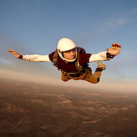 Gabriel Basso skydives in a stunt for 'The Night Agent' Season 2. 