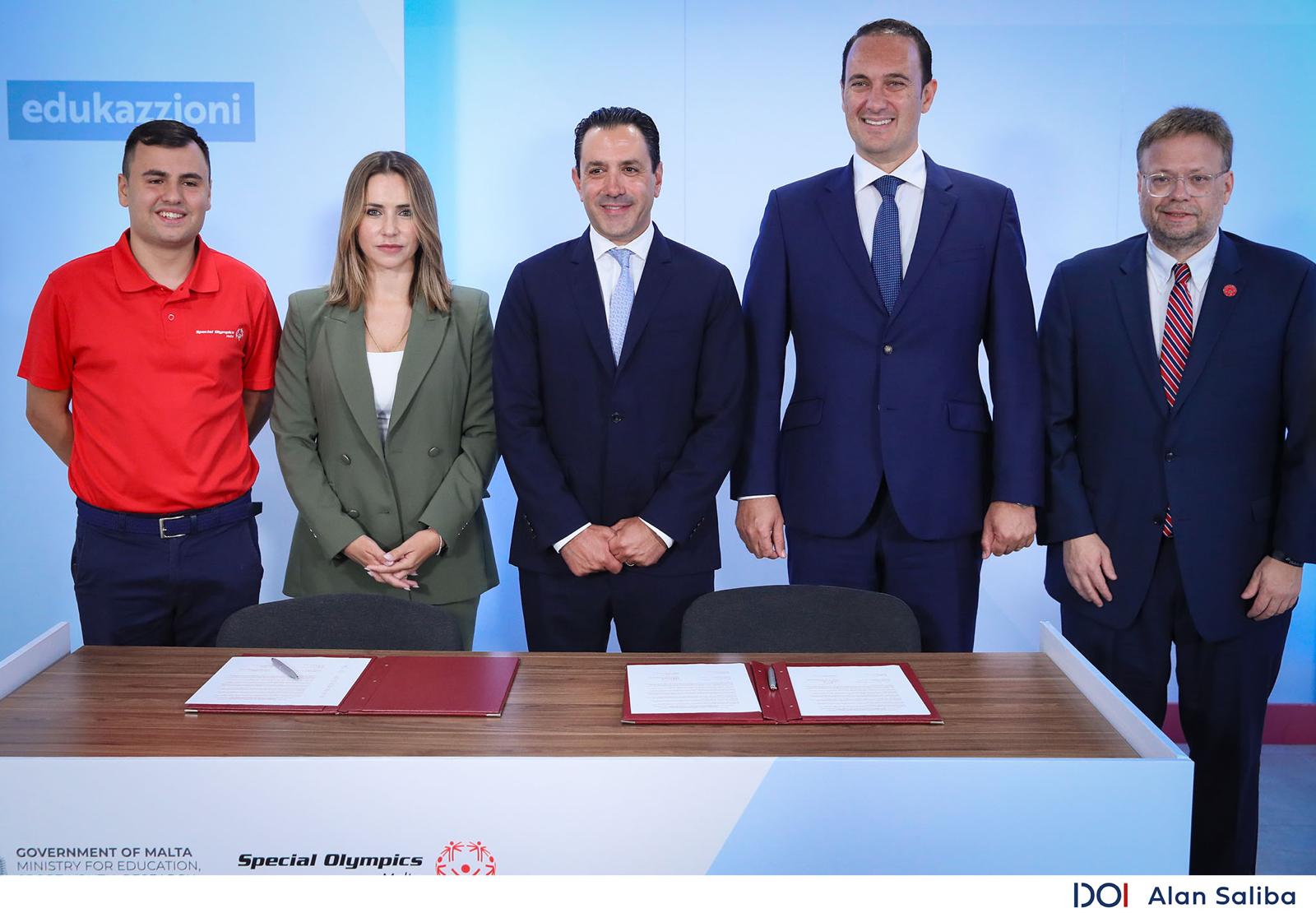 Group photo of five individuals: Special Olympics Malta Leader Gilmour Borg, Special Olympics Malta President Lydia Abela, SOEE President David Evangelista, Malta’s Honorable Minister of Education and Sport Dr. Clifton Grima, and Special Olympics Chief Global Government Relations Shawn Ferguson.