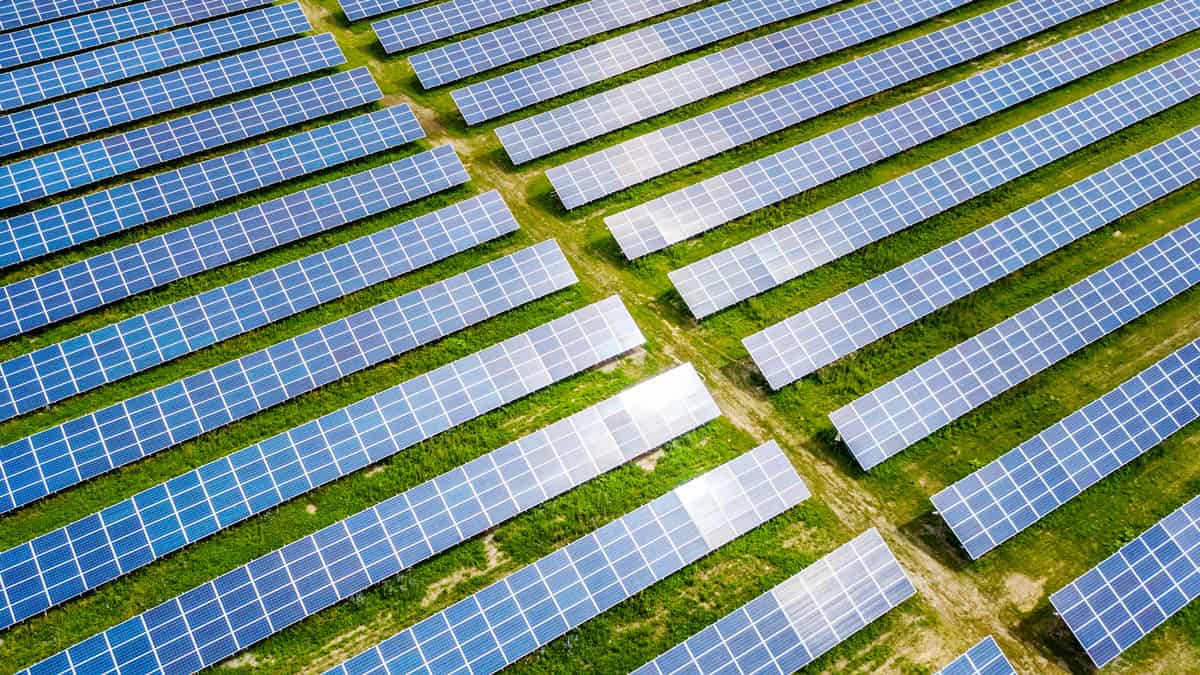 aerial photo looking down at solar panels in a field