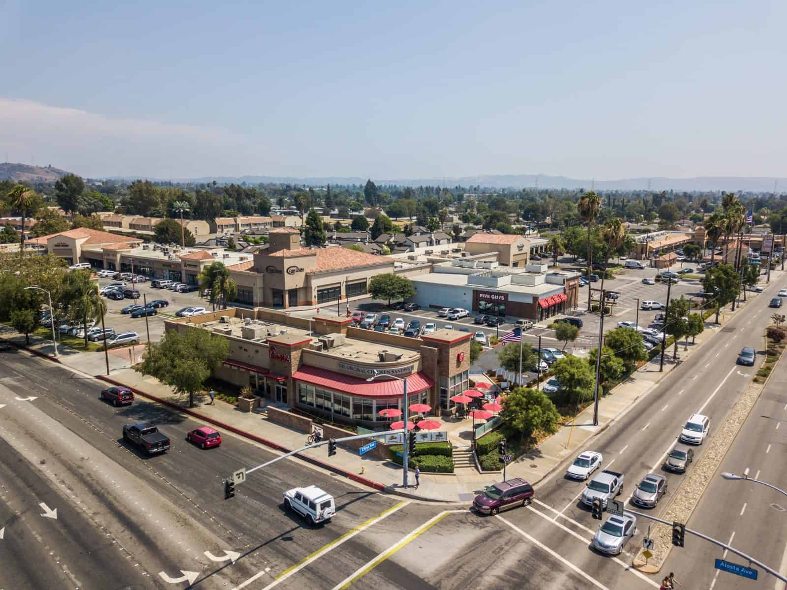 drone photo of shopping strip mall in Azusa, CA