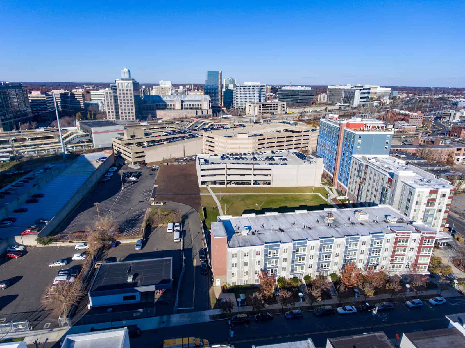 apartment building with parking garage in city in Connecticut