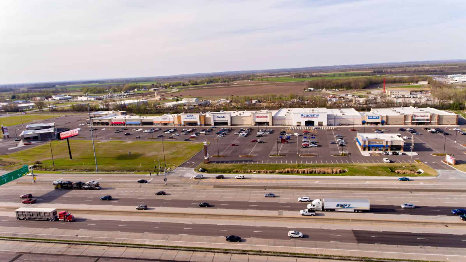 aerial drone photo of strip mall in Missouri taken from the front