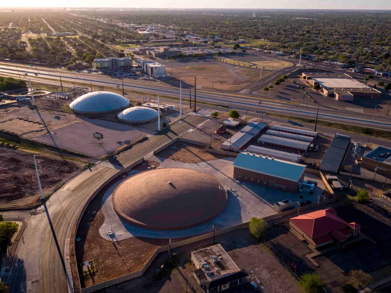 aerial drone photo of a water tank taken at sunset