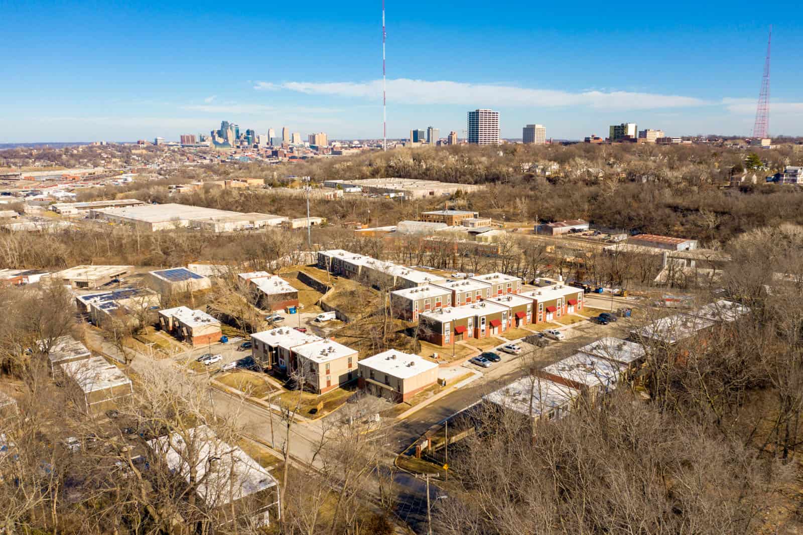 drone photo of apartment complex with Kansas City in background in Kansas City, Missouri