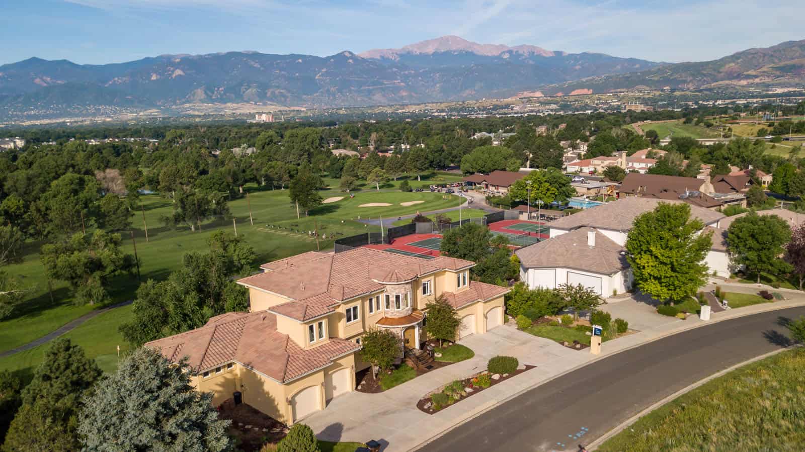 high elevation drone photo of residential real estate property in Colorado Springs, CO