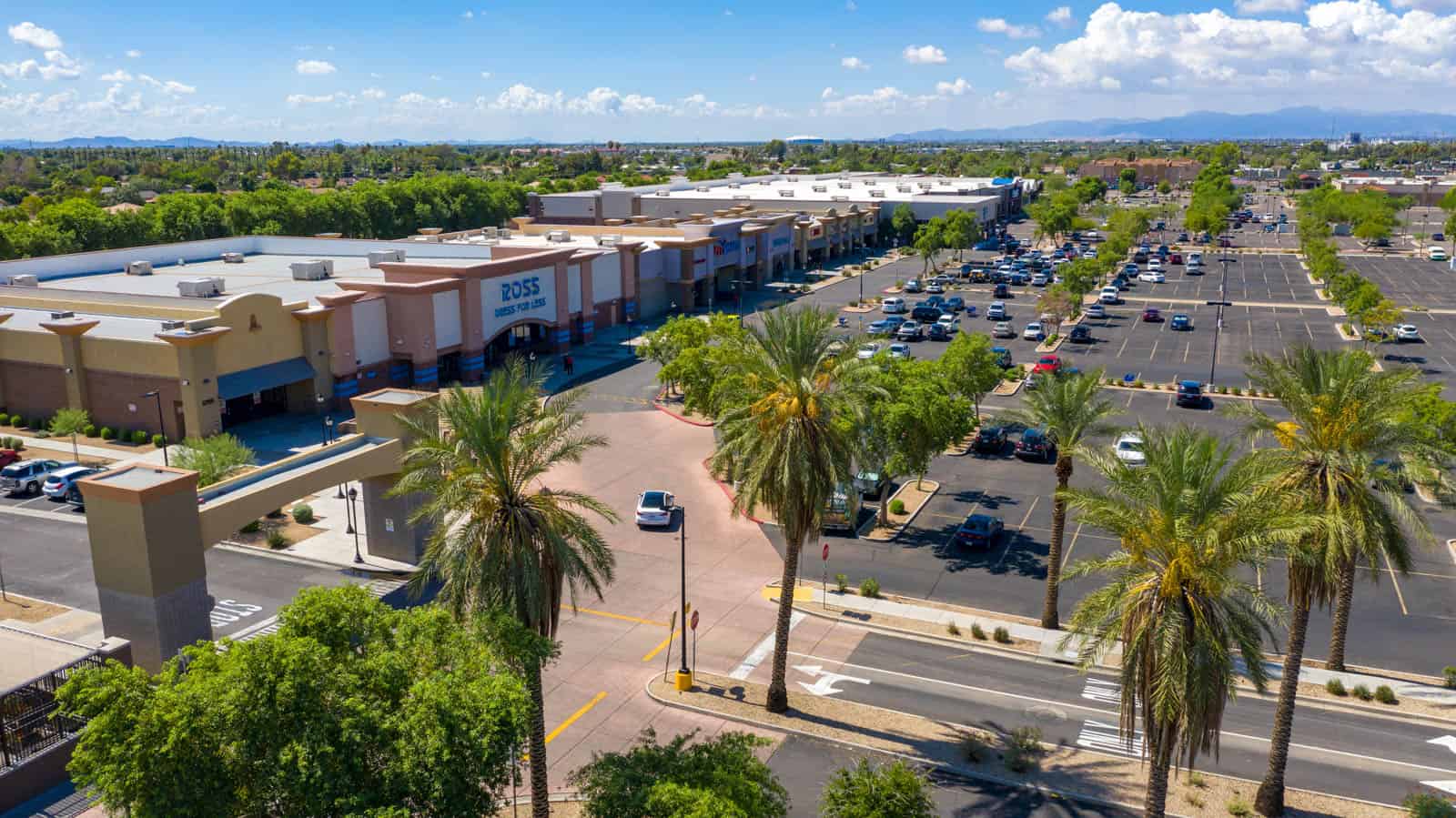 low altitude drone photo of side of strip mall in Glendale, AZ