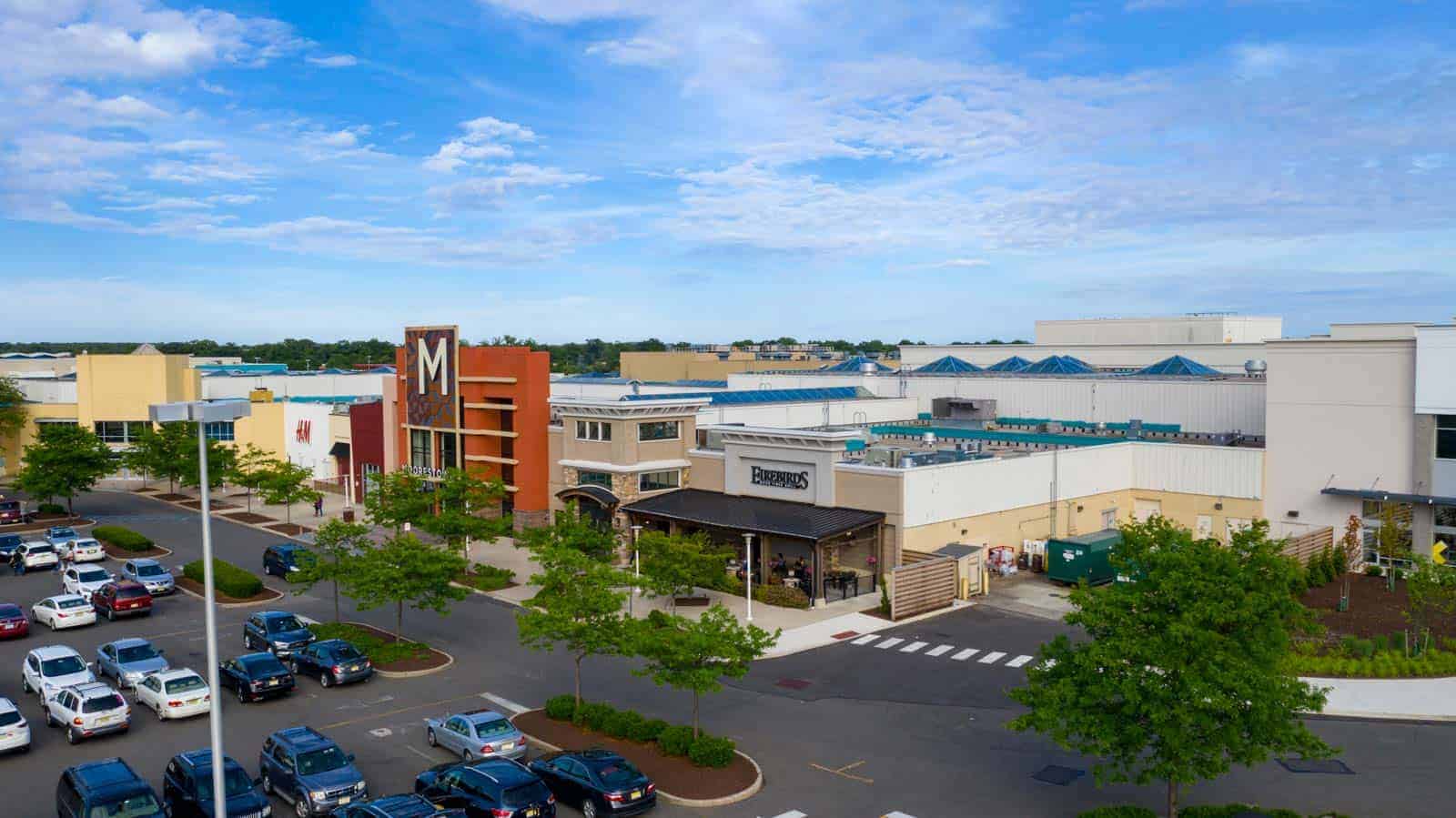 low altitude drone photo of retail store in shopping mall in Moorestown, NJ