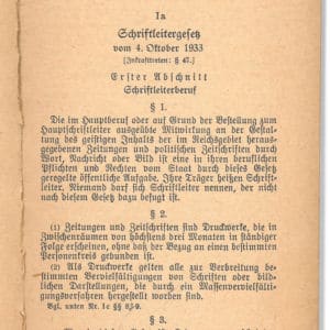 <p>On 4 October 1933, it was decreed that all editors must be ‘Aryan’. Image shows a copy of the Editorship Law.</p>
