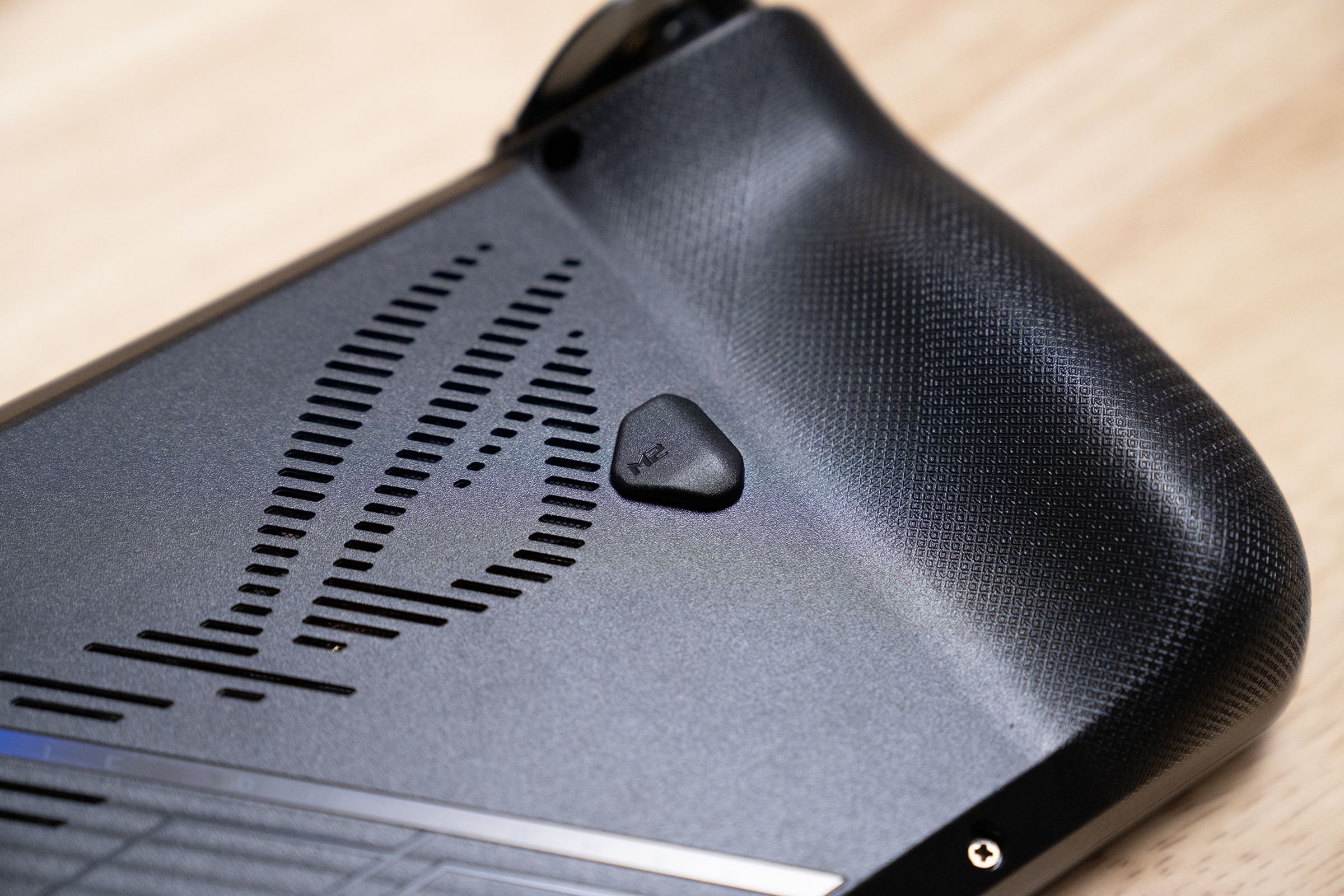 The back buttons and ROG ROG ROG texture of the grips are seen in this image of the back of the ROG Ally X. The grips look quite grippy.