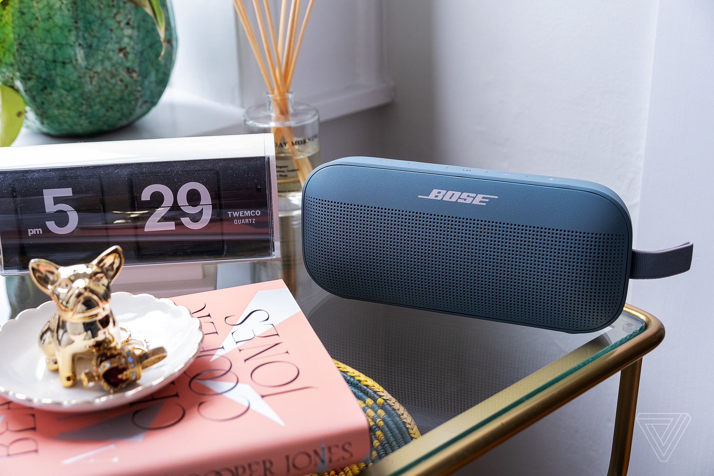 A photo of the Bose SoundLink Flex on a bedside table.