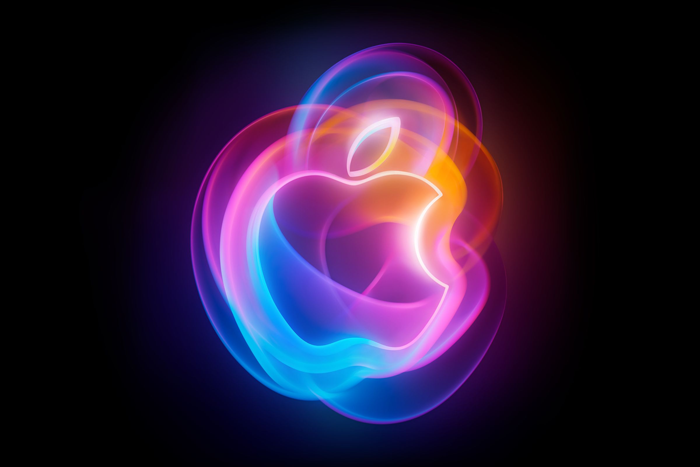 Picture of the Apple Glowtime event: a rainbow-colored Apple logo with rounded shapes overlapping behind and inside of it.