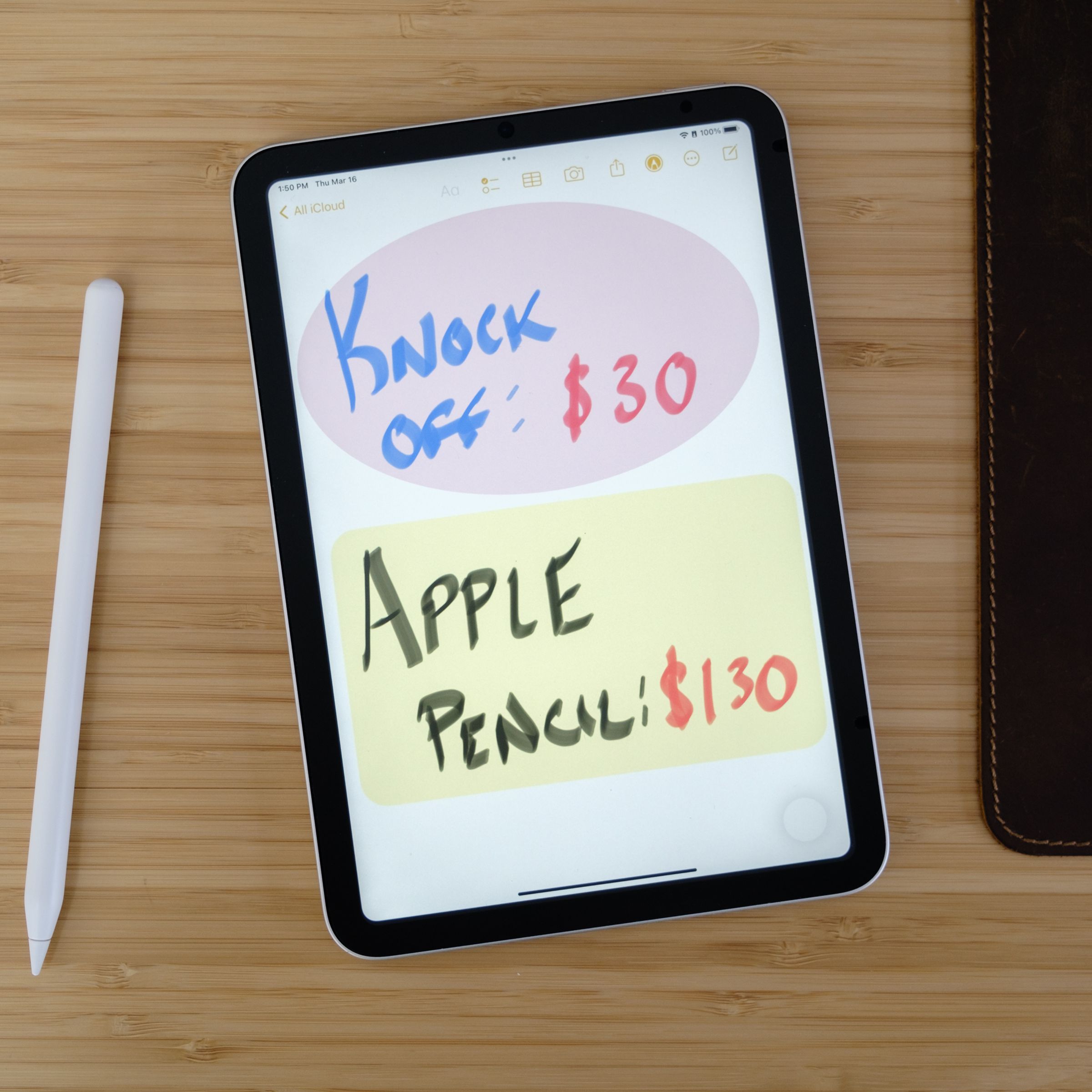 An Apple Pencil-like stylus next to an iPad Mini displaying artwork saying Knockoff: $30 Apple Pencil: $130