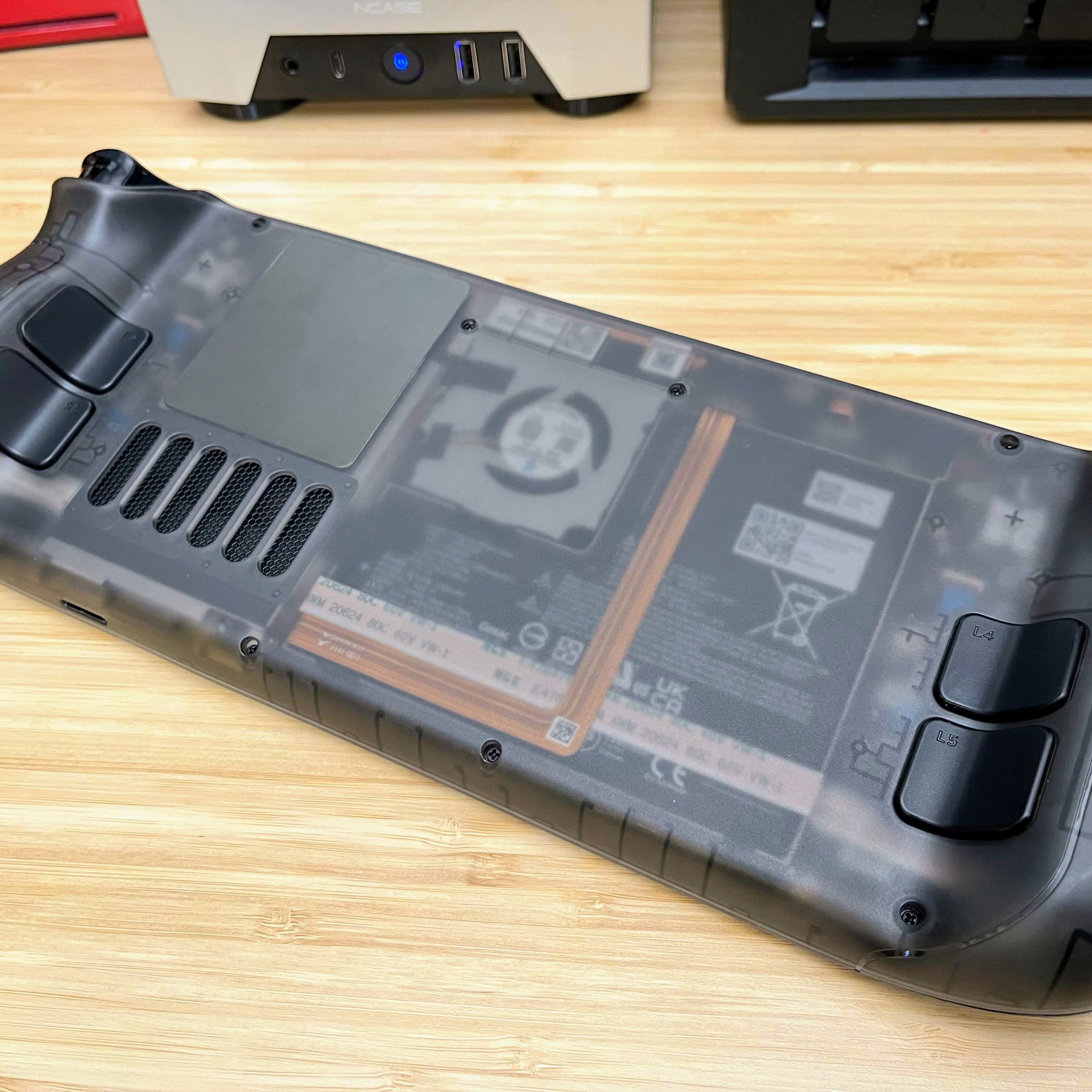 You can see the Steam Deck’s battery and fan through this transparent rear casing.