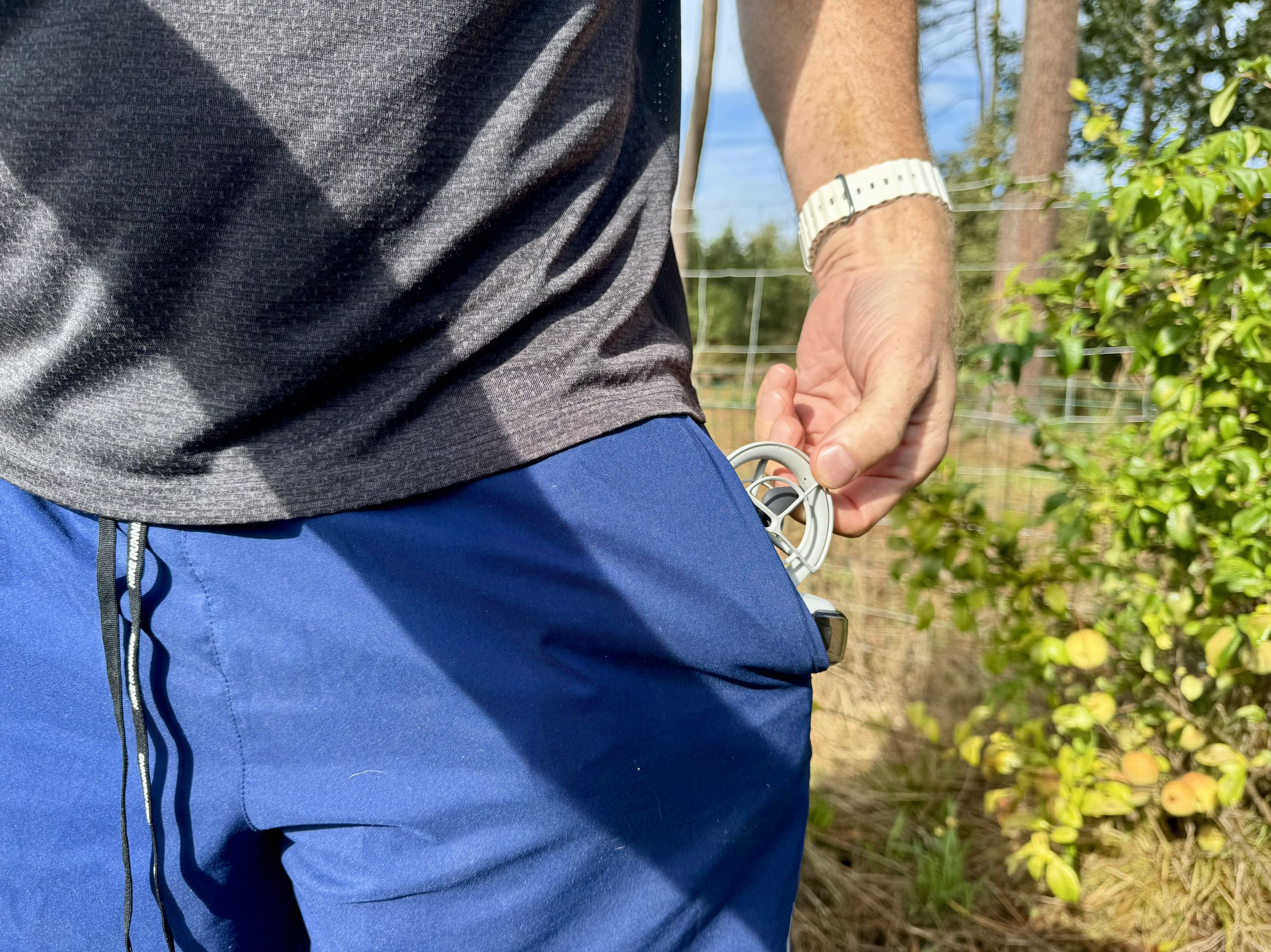 The Neo still fits easily into running shorts.