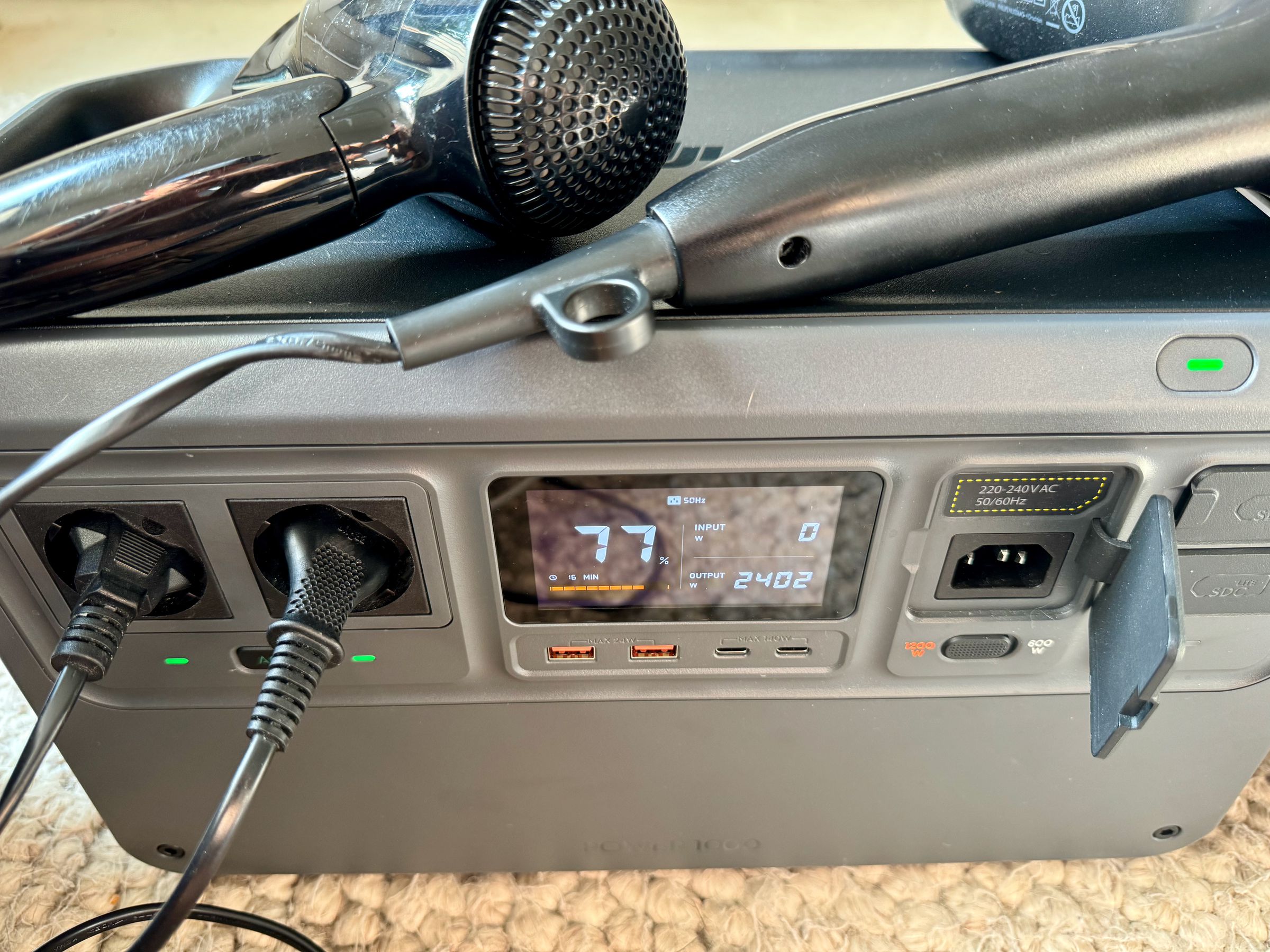 <em>Testing with two hair dryers pulling a constant 2400W. This worked for about one or two minutes, longer than the 30 seconds promised.</em>