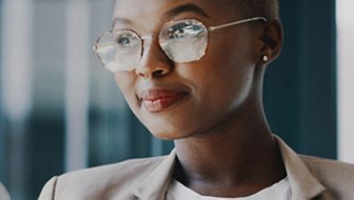 Women with glasses smiling