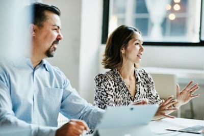 A man and a woman in a meeting