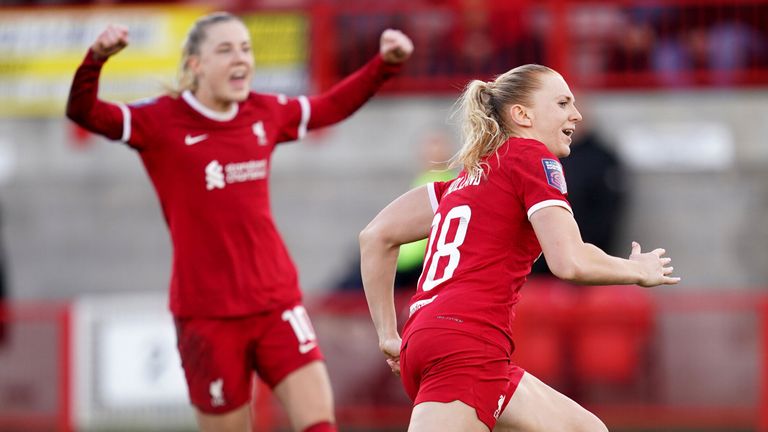 Ceri Holland celebrates after giving Liverpool the lead at Brighton