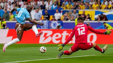 Belgium striker Romelu Lukaku is denied by Ukraine goalkeeper Anatoliy Trubin