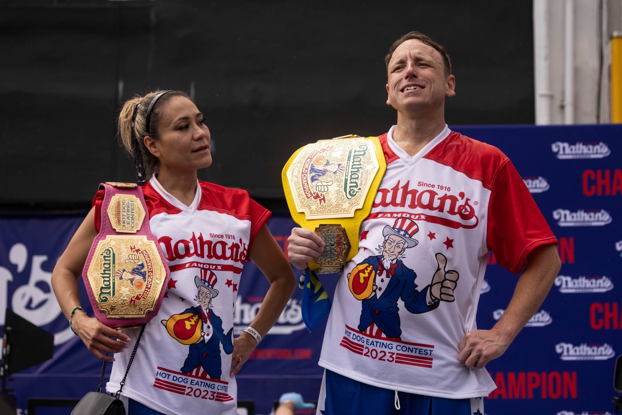 Joey Chestnut and Miki Sudo triumph in rain-soaked Nathans Hot Dog Eating Contest