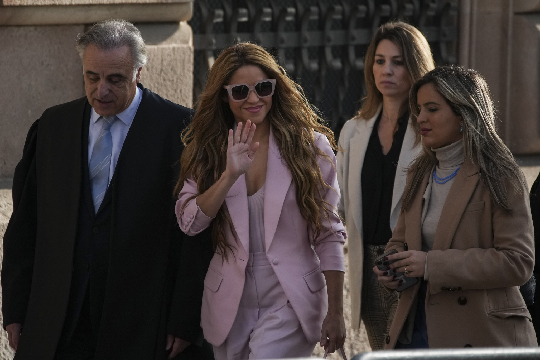 Colombian performer Shakira, center, arrives at court in Barcelona, Spain, Monday.