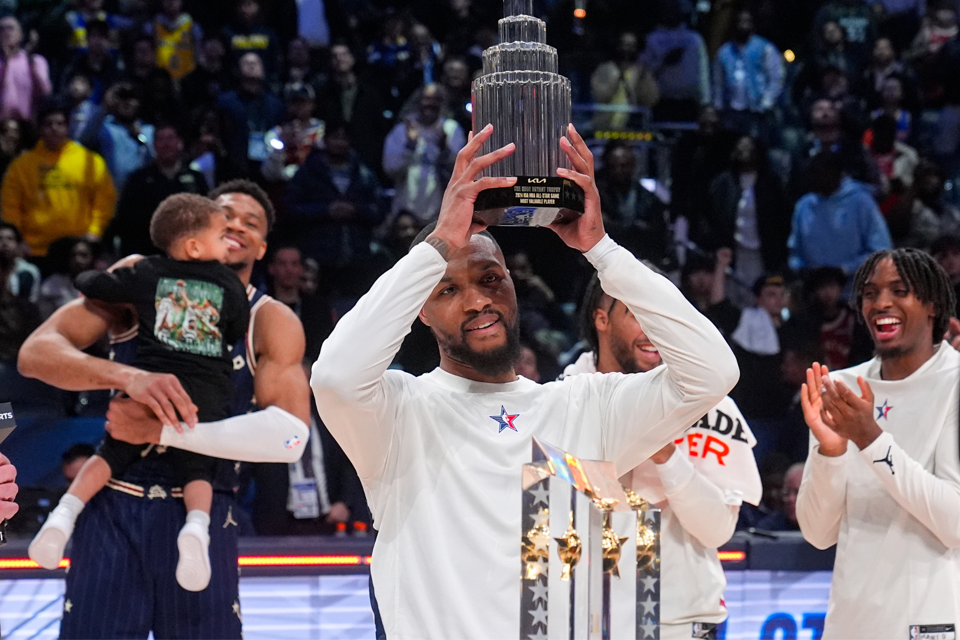 Damian Lillard scored 39 points and lifted the MVP trophy amidst a flurry of boos.