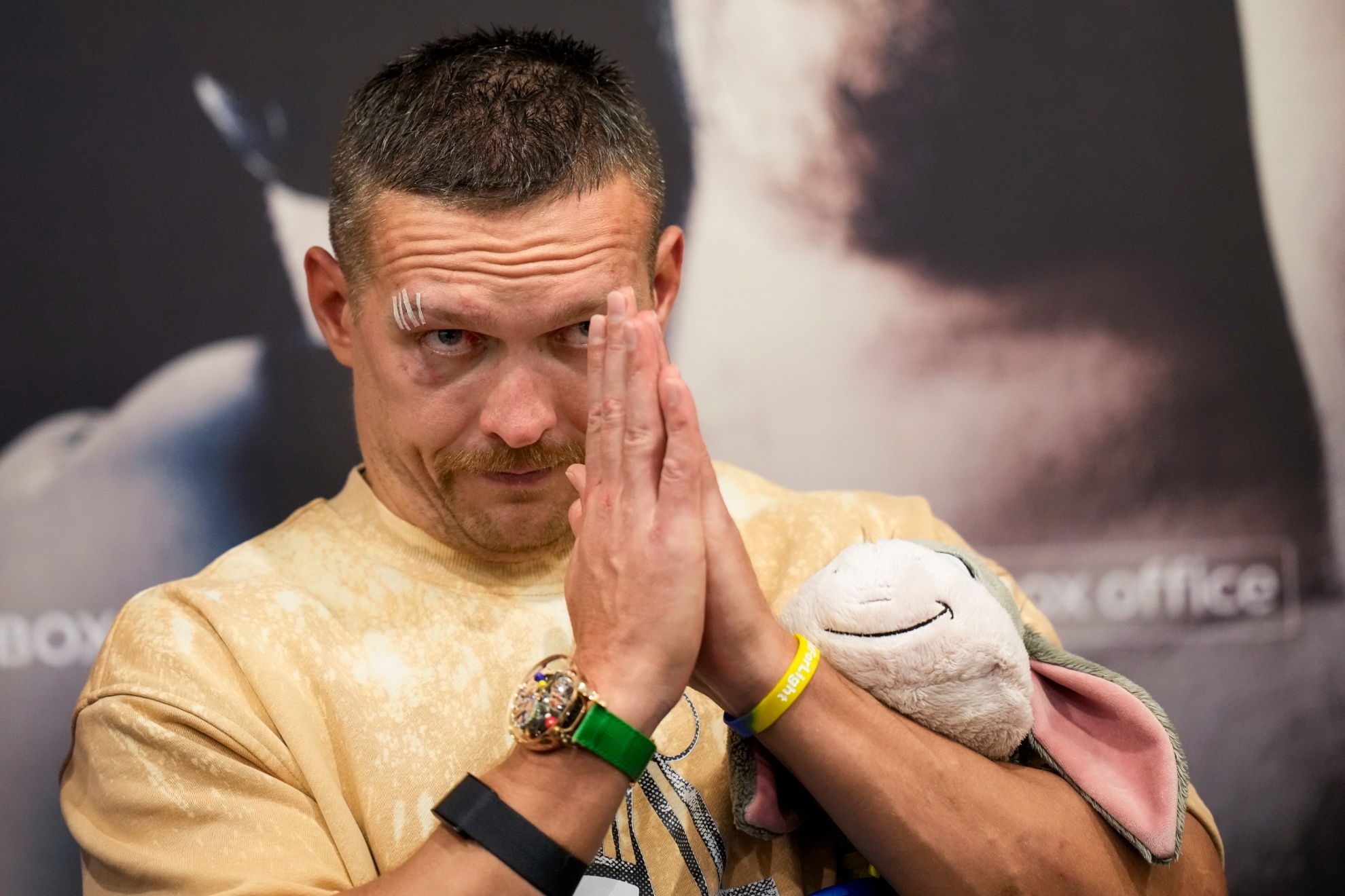 Ukraines Oleksandr Usyk gestures during a news conference following his victory over Britains Tyson Fury in their undisputed heavyweight championship boxing fight at the Kingdom Arena in Riyadh, Saudi Arabia, early Sunday, May 19, 2024. (AP Photo/Francisco Seco)