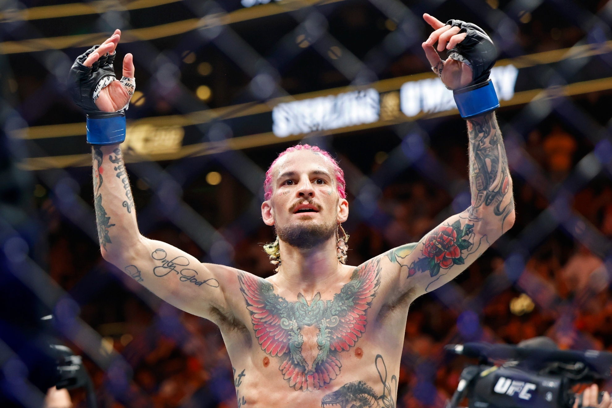 Sean OMalley celebrates after his UFC 292 Bantamweight title mixed martial arts fight, Saturday, August 19, 2023, in Boston. OMalley won the title via 2nd round KO. (AP Photo/Gregory Payan),.