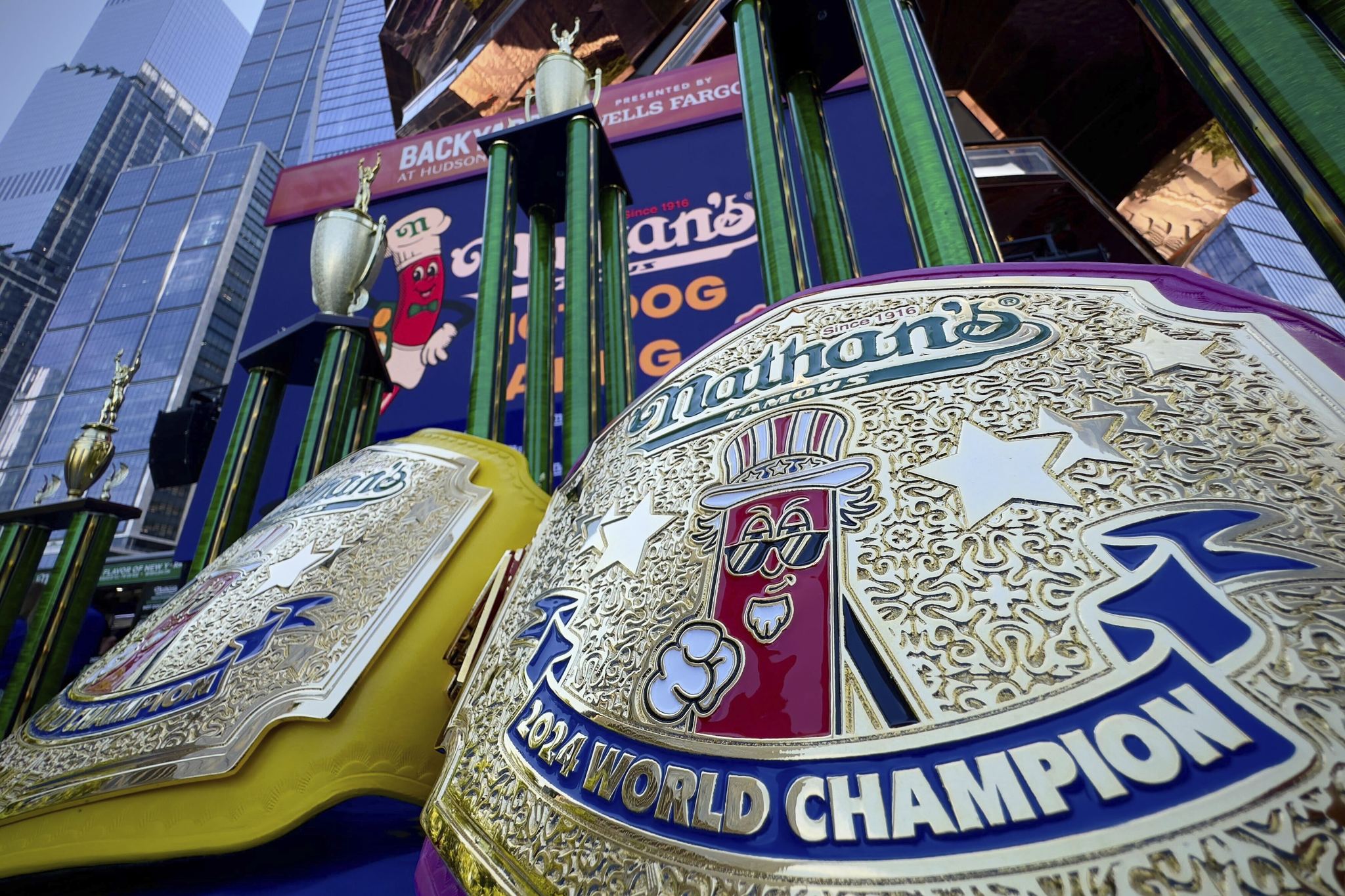 The 2024 Championship belts rest on a table