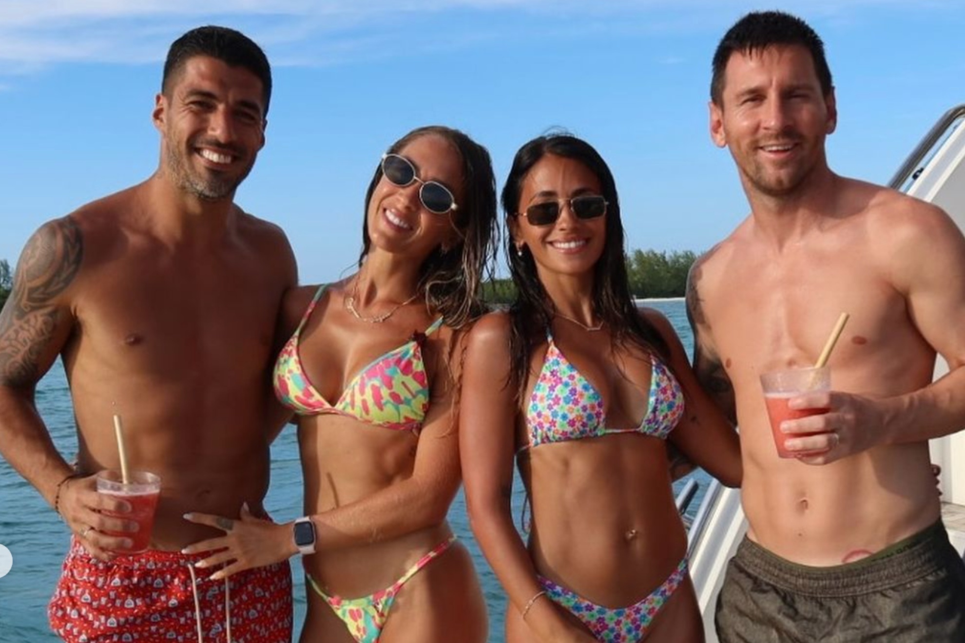 Lionel Messi and Luis Suarez with their wives